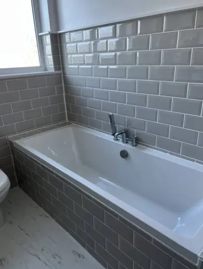 Bath with grey metro tiles